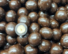Orzech laskowy w czekoladzie mlecznej strzelającej 100g opakowanie bag